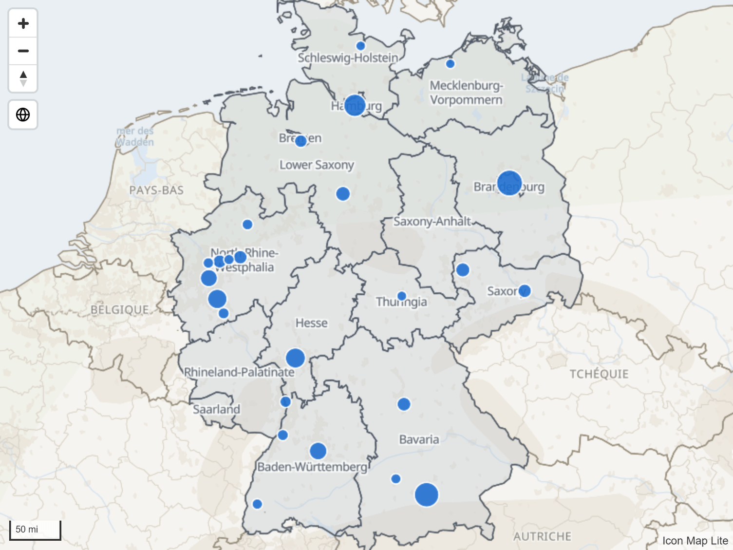 Des limites de régions issues d'un fichier chargé, étiquetées avec leur nom, dessinées sous les cercles des données du rapport