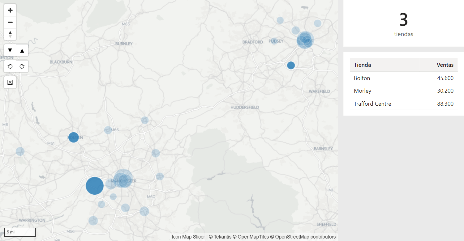 Un mapa de círculos en el que tres círculos seleccionados están opacos y el resto atenuados, junto a una tabla que solo enumera esas tres tiendas
