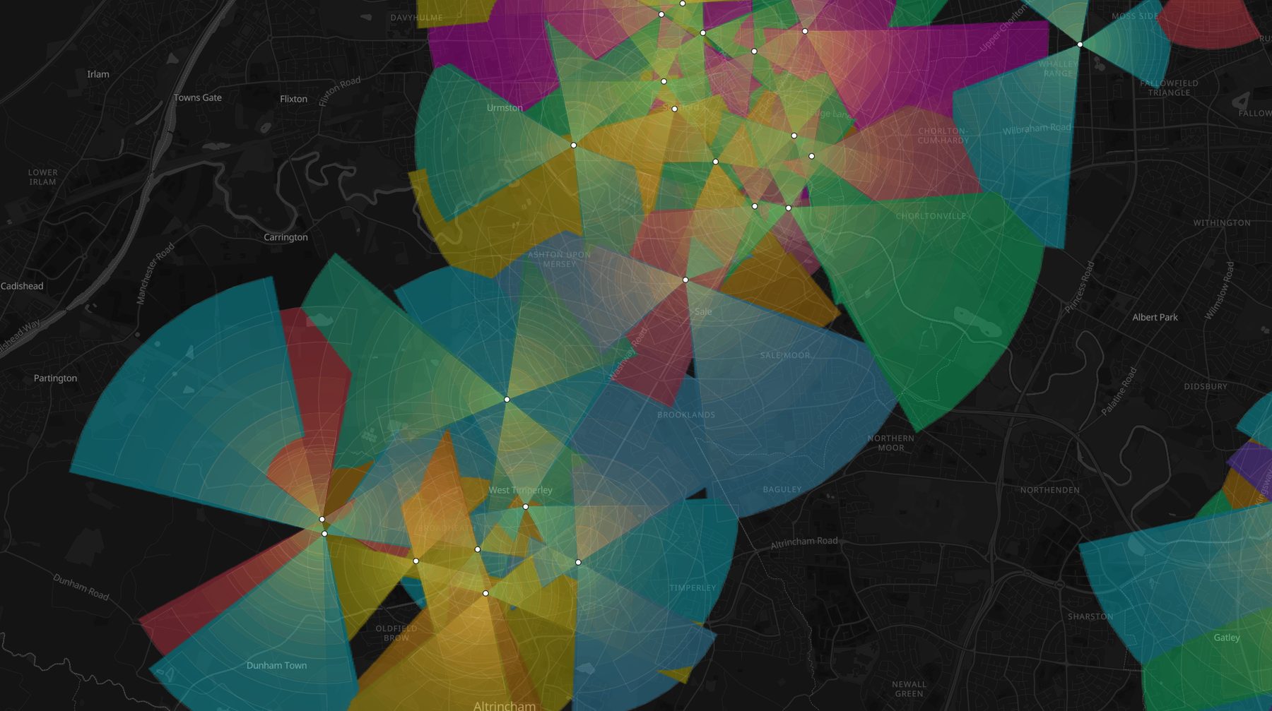 Best-server dominance overlay coloring the map by the strongest serving site, showing handover boundaries between sites
